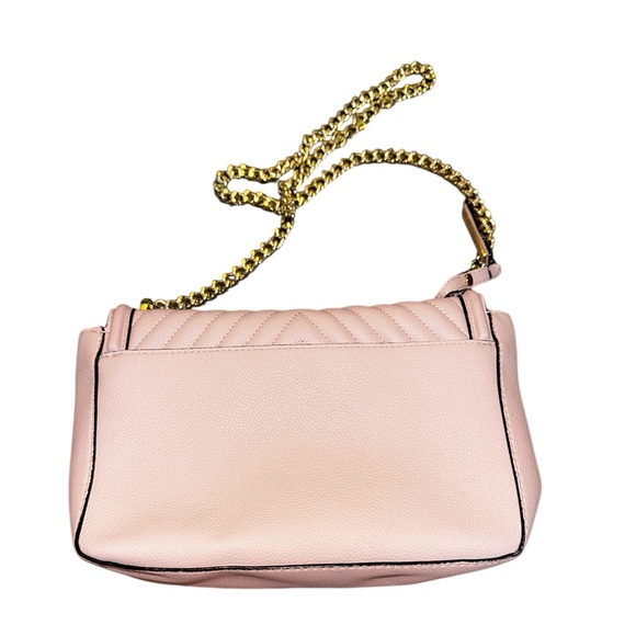 Victoria Secret purse has thick gold chain shoulder strap, magnetic snap pinkish